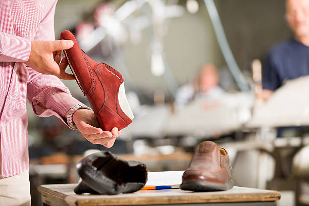 fabbrica di scarpe - image created 21st century still life horizontal close up foto e immagini stock
