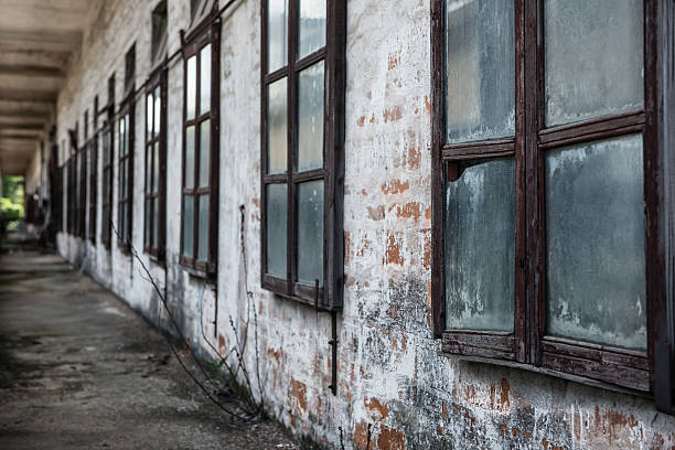 istock windows of an abandoned factory 481189368