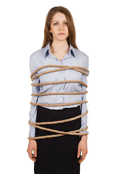 Sad young woman tied a strong rope