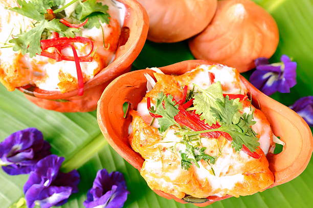 Delicious Thai food,steamed fish with curry paste. stock photo