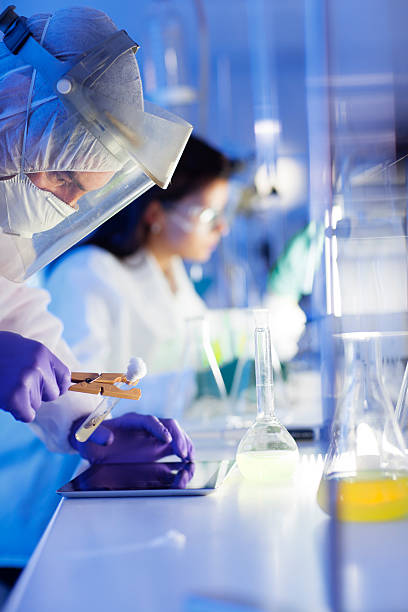group of scientists working at the laboratory