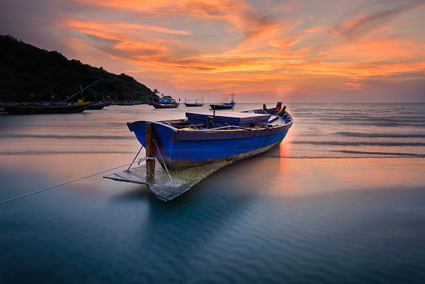 istock Boats at the beach during sunset 481195210