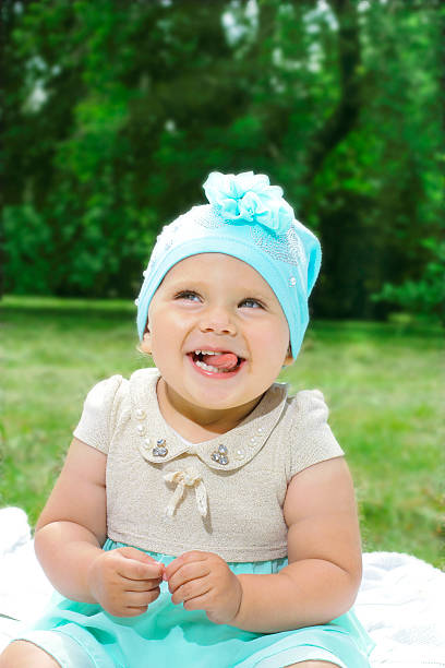 istock baby showing tongue 481199492