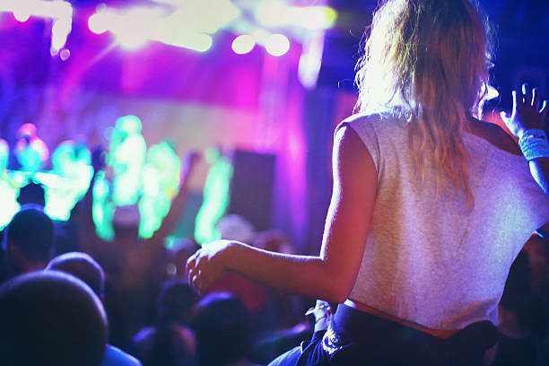 istock People enjoying a concert. 481200296
