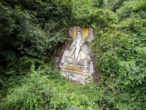 the mount qingcheng at Dujiangyan in Sichuan Province, China. Guan Yin is known as the bodhisattva of great mercy. In Chinese temples this bodhisattva often takes a female form. Chinese Buddhists traditionally see her as one of the four bodhisattvas.https://lh6.googleusercontent.com/-XG-peLYAmCc/U0GIoga4WrI/AAAAAAAAA40/6t9Fzv0r8-0/w380-h200-no/banner_Sichuan.png