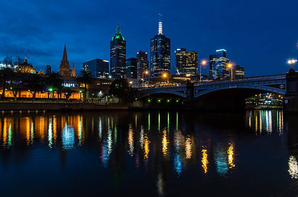View of Flinders Street Station and Princes Bridge from Southgate on the Yarra River in Melbourne, Australia