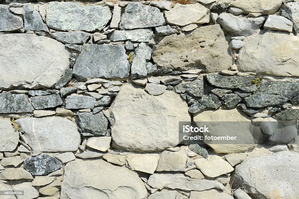 Background of stone wall Background of stone wall texture photo 2015 Stock Photo