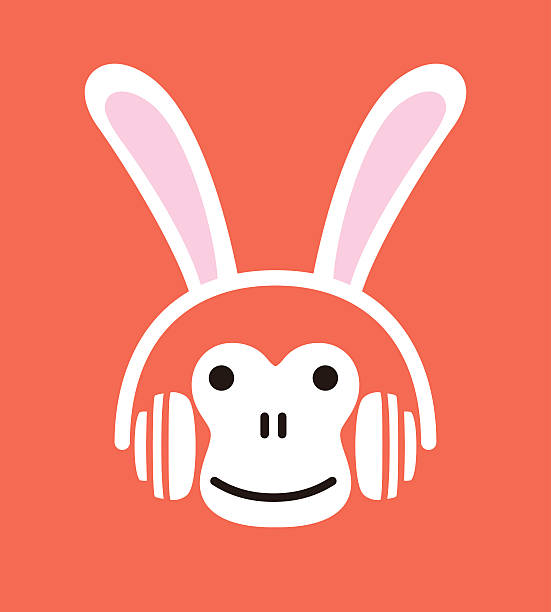 kreskówka, małpa na sobie króliczej zestaw słuchawkowy, wektor - animal ear audio stock illustrations