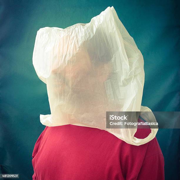 Man With Plastic Bag Over His Head Stock Photo - Download Now - Plastic, Plastic Bag, Suffocated - iStock
