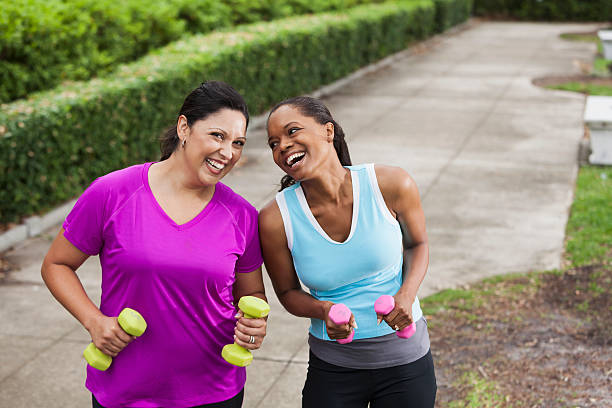 istock Women exercising in park 481209665