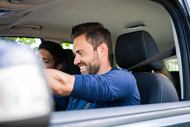 istock Friends sitting in the car ready to start vacations 481211156