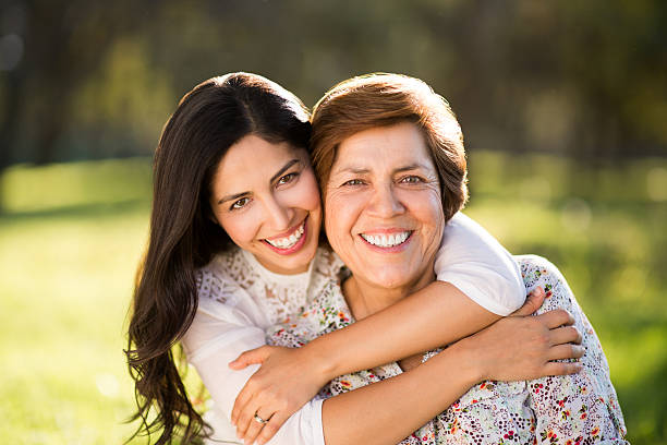 istock Happy latin mother and daughter 481211246