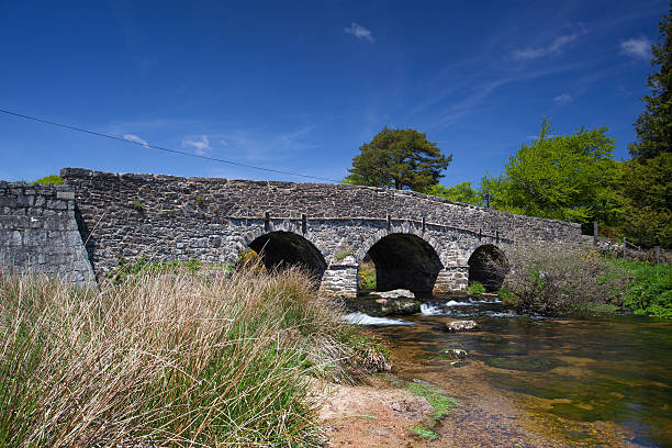 istock The ancient clapper bridge at Postbridges in Dartmoor National P 481212955