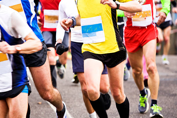 istock People running in city marathon 481213018