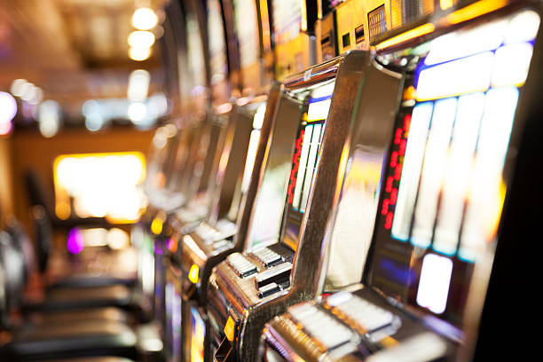 istock Row of  slot machines inside a casino 481214855