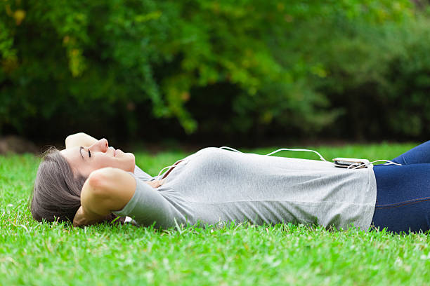 istock Relaxed woman listening music 481215613