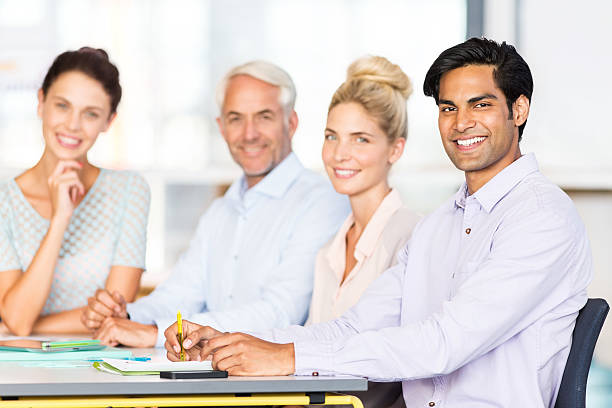 istock Business People At Conference Table In Office Meeting 481217426