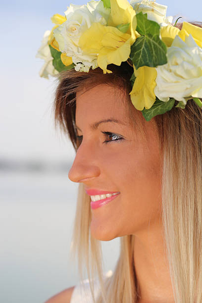 istock pretty young woman with rosary beads 481222480