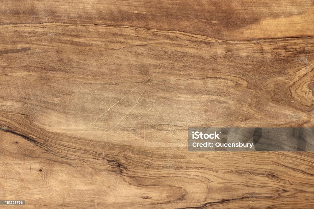 Olive wood Close up of an olive wood cutting board Wood - Material Stock Photo
