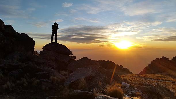 istock photographing the sunset 481227390