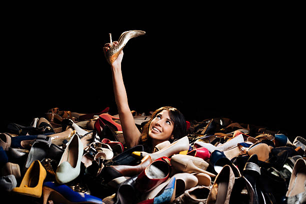 Confident woman choosing high heels in a store