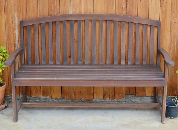 istock wood bench on the wood wall 481232324
