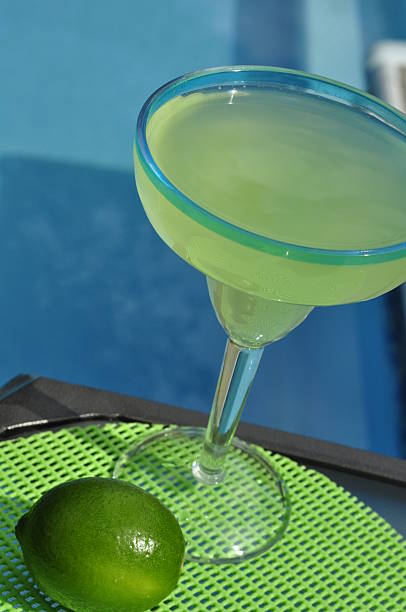 istock One Margarita and Lime on Small Table Poolside 481235776