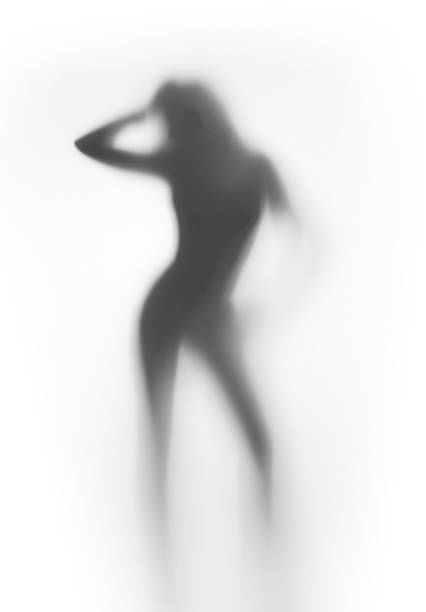 istock Beautiful woman stands, behind a curtain, silhouette 481236885