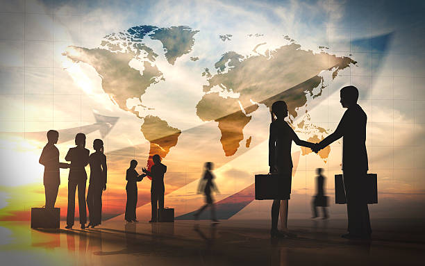 Global team business shake hand silhouettes city with world maps Global team business shake hand silhouettes city with world maps rendered with computer graphic 3D. global business handshake stock pictures, royalty-free photos & images