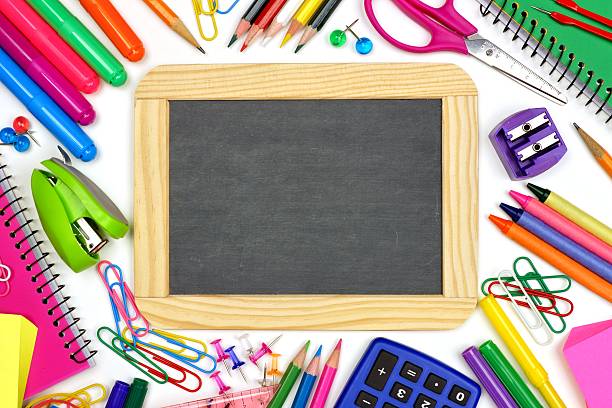 istock Blank chalkboard with school supplies frame 481238462
