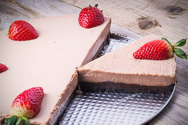 istock Chocolate cake with strawberries in a tray 481249114