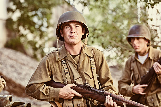 istock World War II Soldier Holding Rifle While on Patrol 481251868