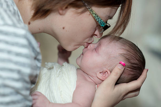 istock Mom Kisses Baby 481251913