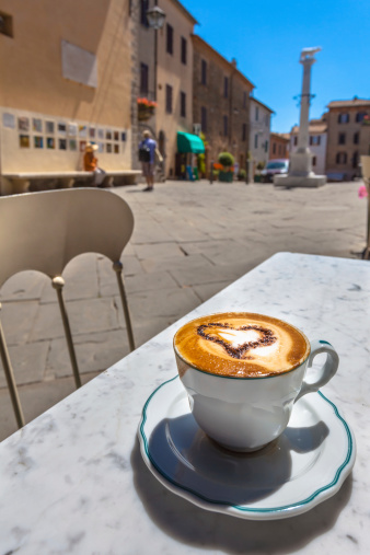 Having a Cup of Cappucino in an Italian Town