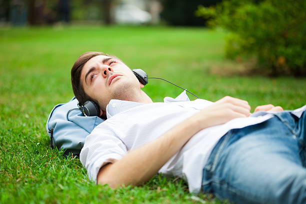istock Relaxed man listening music 481258493