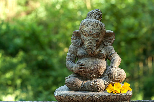 istock Ganesha with yellow flowers 481259862