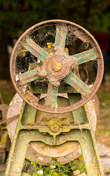 istock Rusty farm machinery with flywheel 481259905