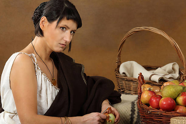 istock Young Romana peeling the onion with basket 481259965