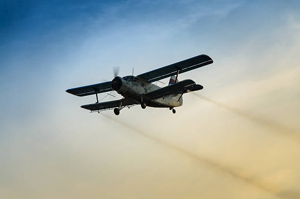 istock Airplane flying in the sky spraying mosquitoes 481263858