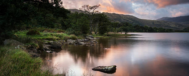 istock Panorama landscape stunning sunrise over lake with mountains 481265369