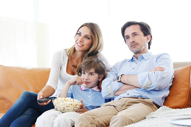 istock family watching movie 481271058