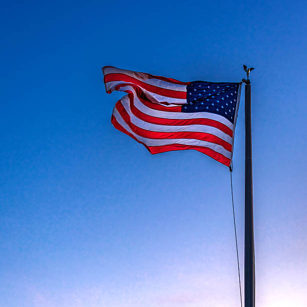 istock American Flag flying in the breeze 481274460