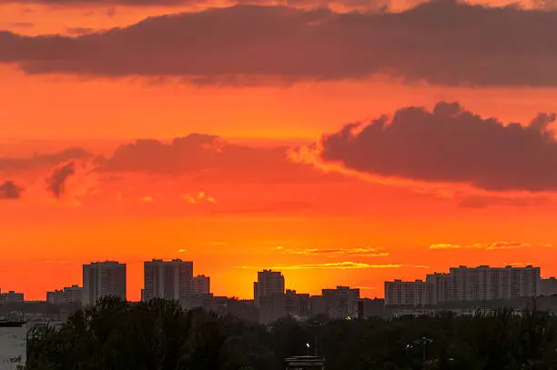 Brightorange sunset over skyline. Moscow, Russia.
