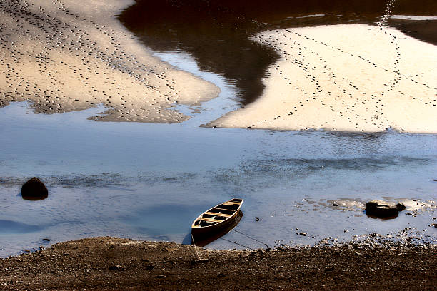 Boat on shore of Medicine Lake in Jasper National Park Alberta