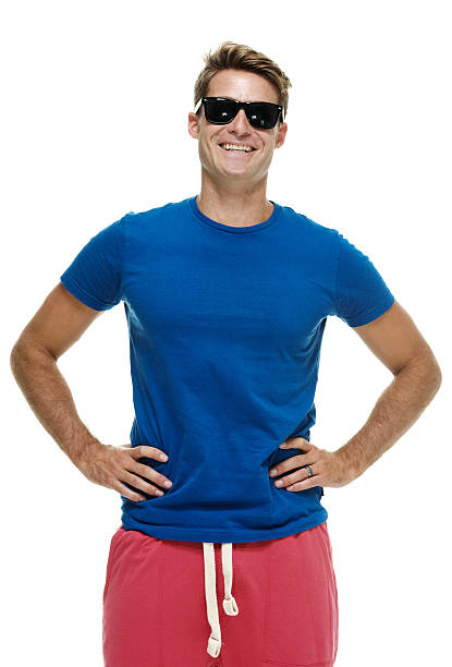 istock Smiling male standing and looking at camera 481277886