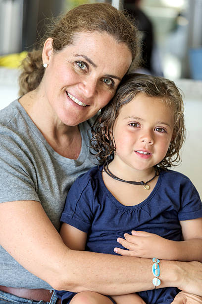 istock Smiling mother and daughter 481278288