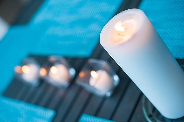 istock Votive Candles On Patio Table 481278616