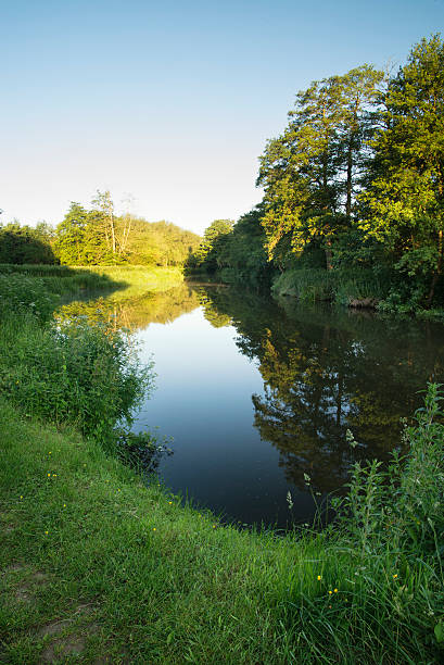 istock Stunning beautiful sunrise landscape over river on Summer mornin 481288324