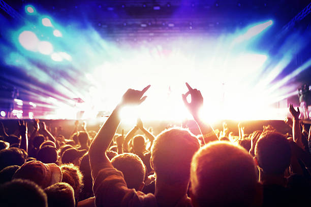 istock People at concert party. 481290744