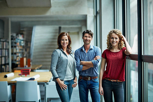 portrait of group of creative business people - three people imagens e fotografias de stock